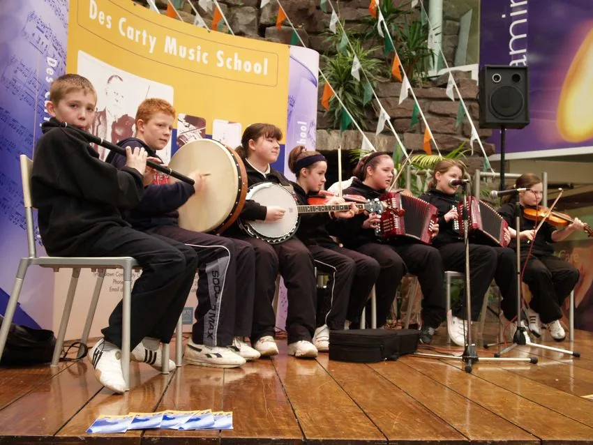 Des Carty Music School students performing in The Square, Tallaght