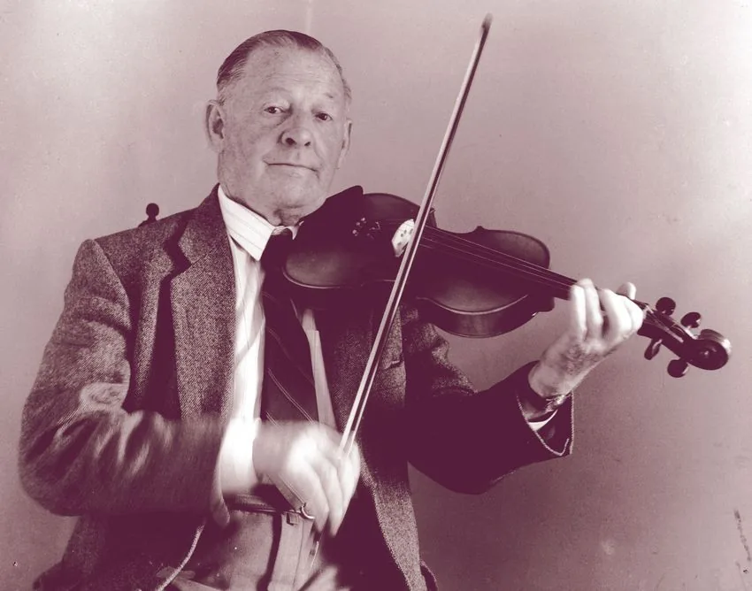 Close-up of a fiddle neck and bow