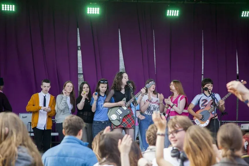 Young band performing on the outdoor stage at the SubSounds Youth Music Festival